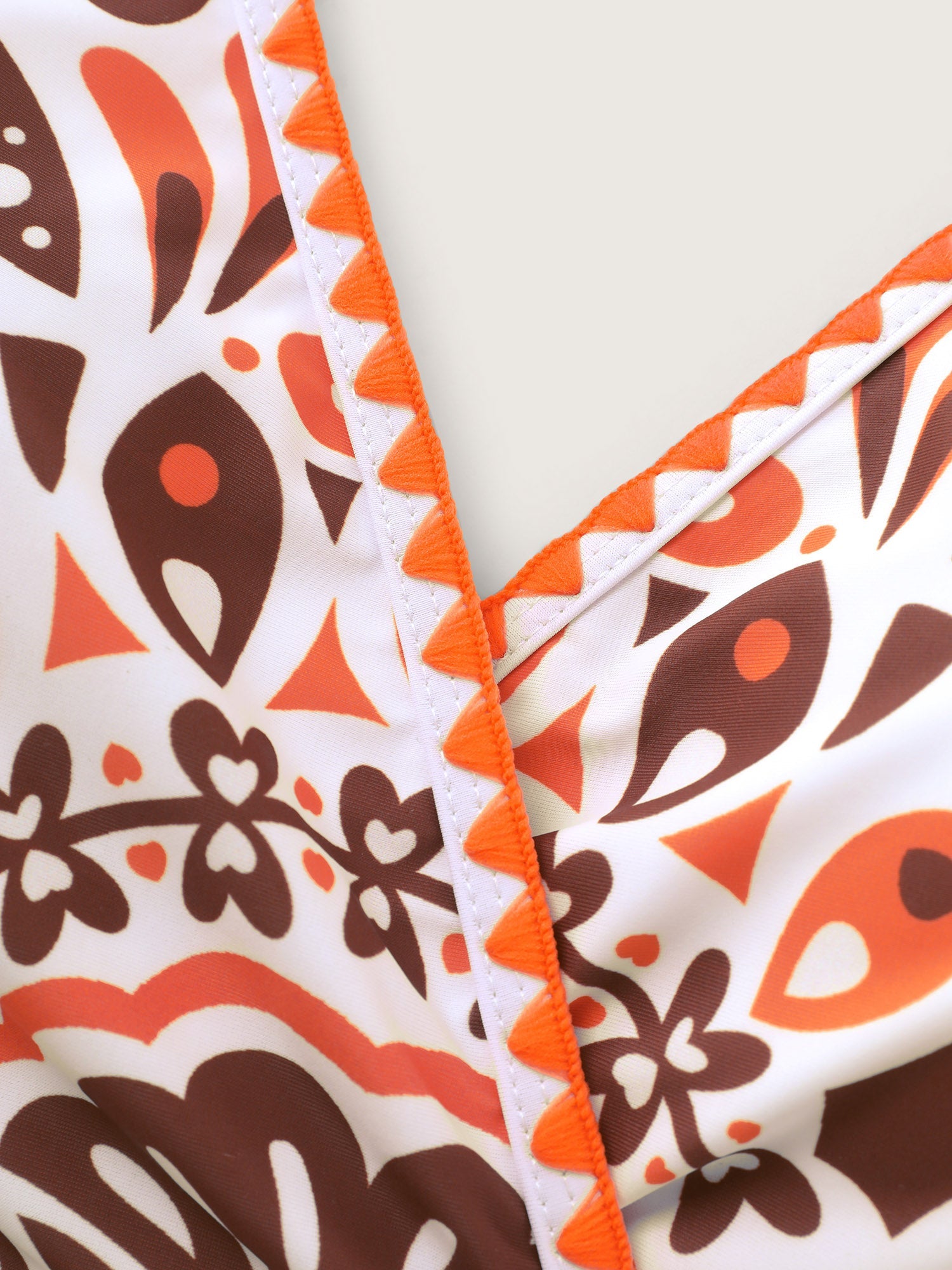 Geometric Embroidered Surplice Neckline Swim Top